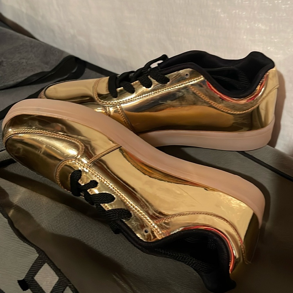 Gold patent looking tennis shoes, never worn